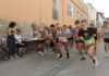 Javier Castells y Alodia Martínez bailan la jota de los pollos en la carrera pedestre de Ballobar